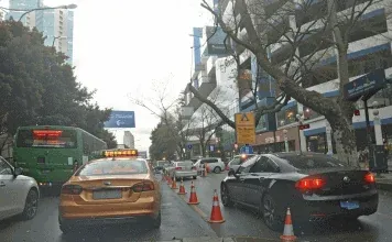 JoinAI Simulaix generated daytime road scene 3, showing a busy city street with traffic cones.